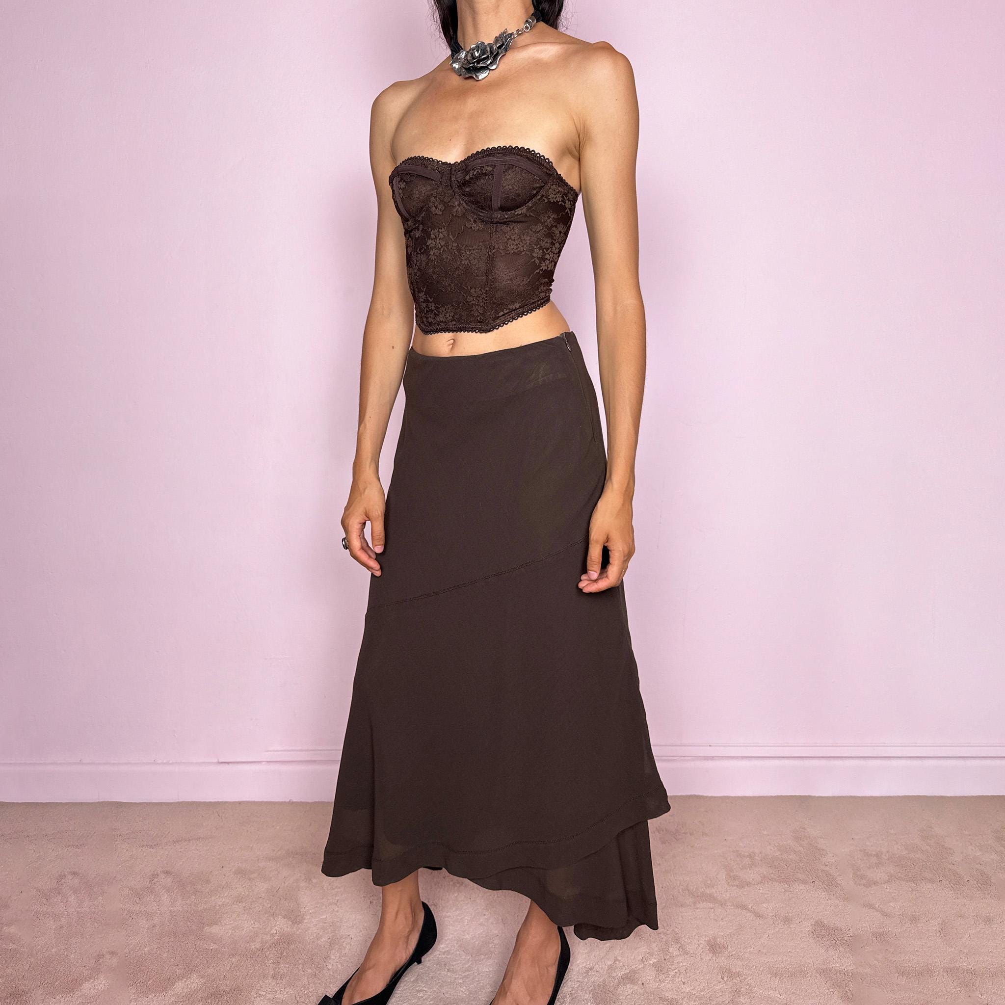 Vintage 2000s Alberta Ferretti brown A-line skirt, made in Italy from a 90% virgin wool and 10% nylon blend. Designed with a side zip closure, no stretch, and an asymmetric layered panel. An elegant and versatile Italian designer piece. Can be worn high-waisted on size S, or slightly lower on the waist for XS and XXS. Excellent vintage condition.