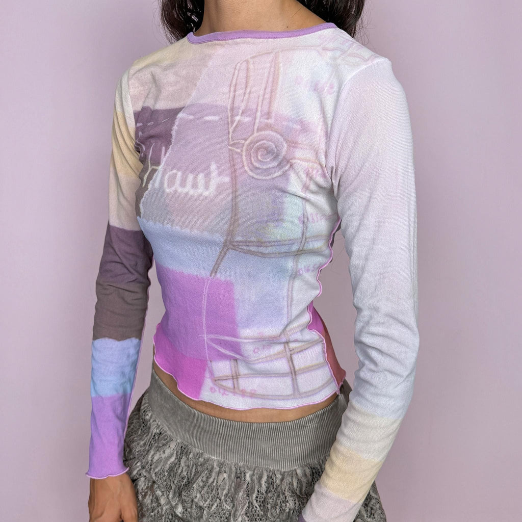 Vintage 2000s Cop Copine long-sleeve top featuring a soft pastel graphic print in lilac, cream, and pink tones. Designed with a fitted silhouette, round neckline, and contrasting color-blocked sleeves. Soft and stretchy with a lightweight, second-skin feel. A playful pastel Y2K piece by a French brand with a dreamy graphic-art aesthetic. The composition label is missing, so the exact fabric is unknown. Excellent vintage condition.