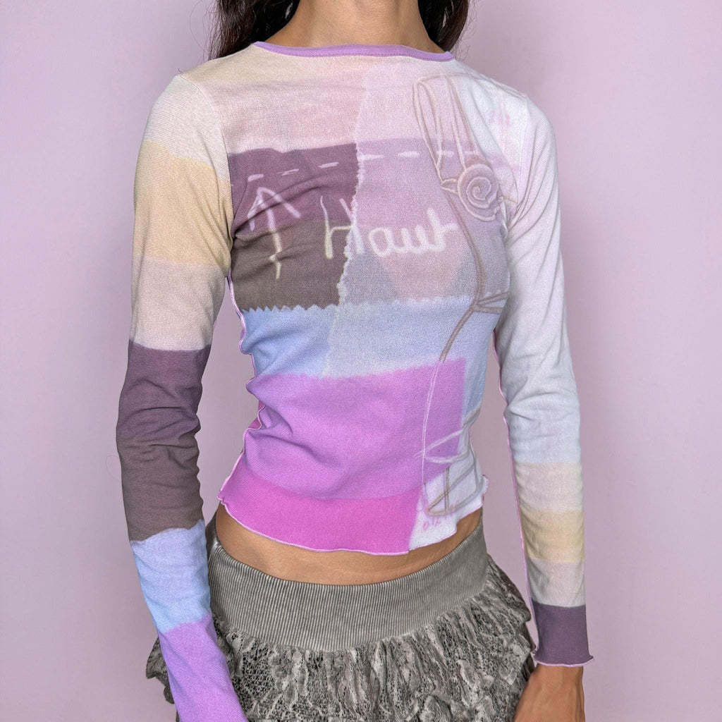 Vintage 2000s Cop Copine long-sleeve top featuring a soft pastel graphic print in lilac, cream, and pink tones. Designed with a fitted silhouette, round neckline, and contrasting color-blocked sleeves. Soft and stretchy with a lightweight, second-skin feel. A playful pastel Y2K piece by a French brand with a dreamy graphic-art aesthetic. The composition label is missing, so the exact fabric is unknown. Excellent vintage condition.