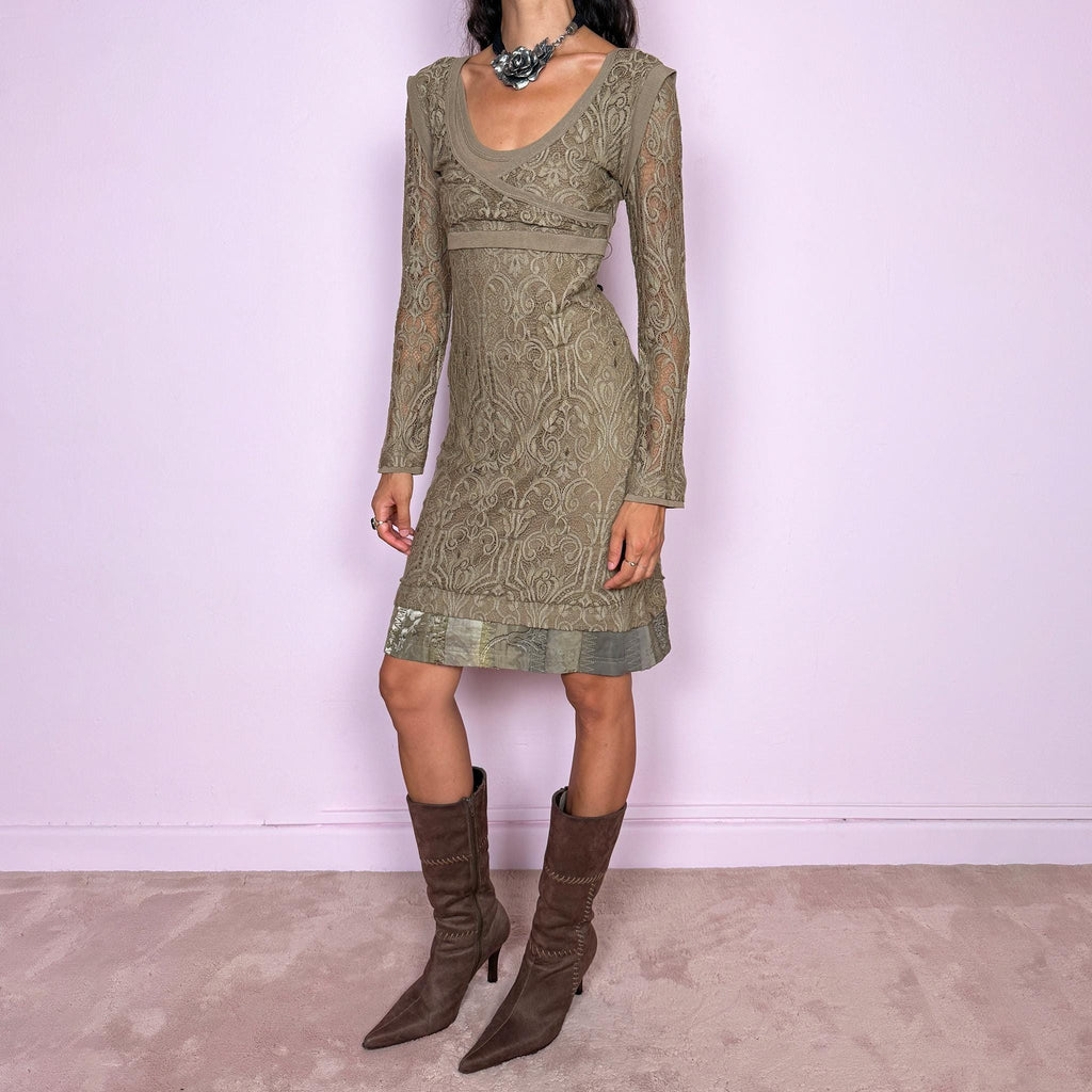 Vintage 2000s Save the Queen midi dress in an antique golden beige-brown tone, crafted from intricate stretch lace with an ornate baroque-inspired pattern throughout. Features long semi-sheer lace sleeves, a wide scoop neckline, layered asymmetric panel detailing across the bust, and a side zip closure. An elegant Y2K Italian design. Made in Italy from 100% polyamide. Excellent vintage condition.