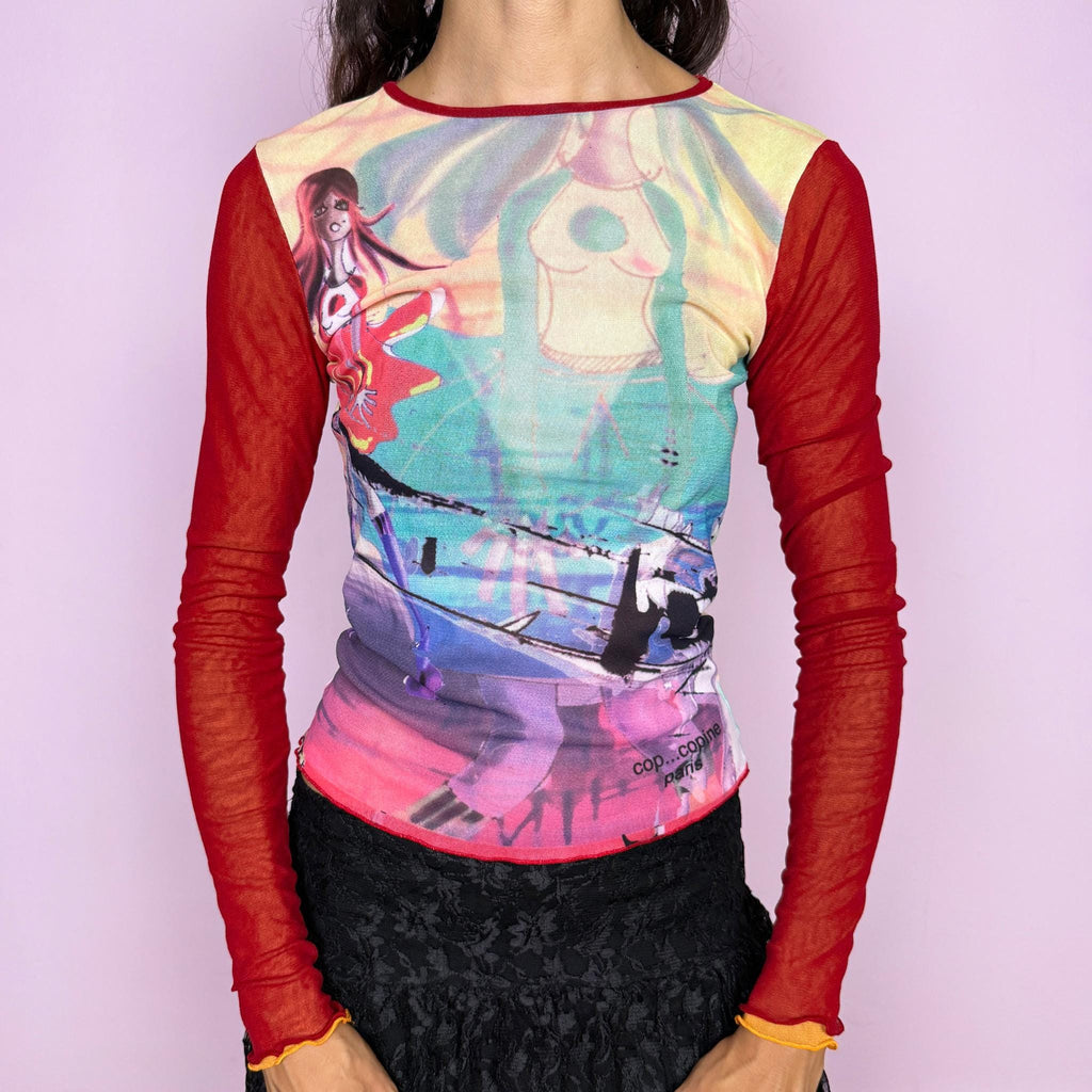 Vintage 2000s Cop Copine graphic mesh top featuring a vibrant multicolored illustrated print with female figures and abstract graphics across the body, contrasted with sheer red mesh long sleeves and delicate lettuce-edge finishes. The fitted second-skin silhouette and semi-sheer construction give it a distinctive Y2K French maximalist, avant-garde art-to-wear feel. Made in France from a stretchy polyamide and polyester blend. Excellent vintage condition.