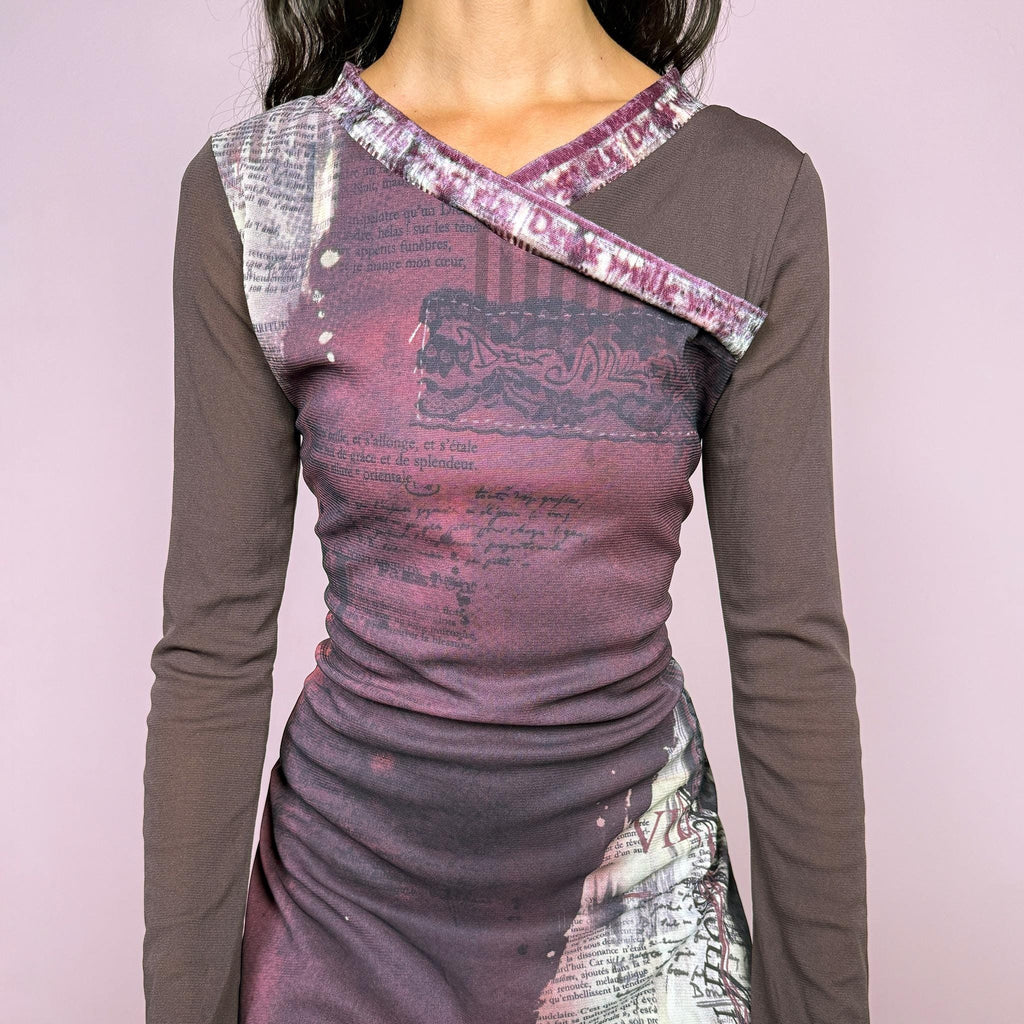 Vintage 2000s avant-garde stretchy mesh dress featuring an abstract layered graphic print in purple and cream tones, with contrasting brown semi-sheer long sleeves, asymmetric neckline detailing, and a dramatic irregular layered hem. The deconstructed style has a distinctly Y2K art-to-wear feel. Made in France by a French brand from polyamide and polyester. Excellent vintage condition.