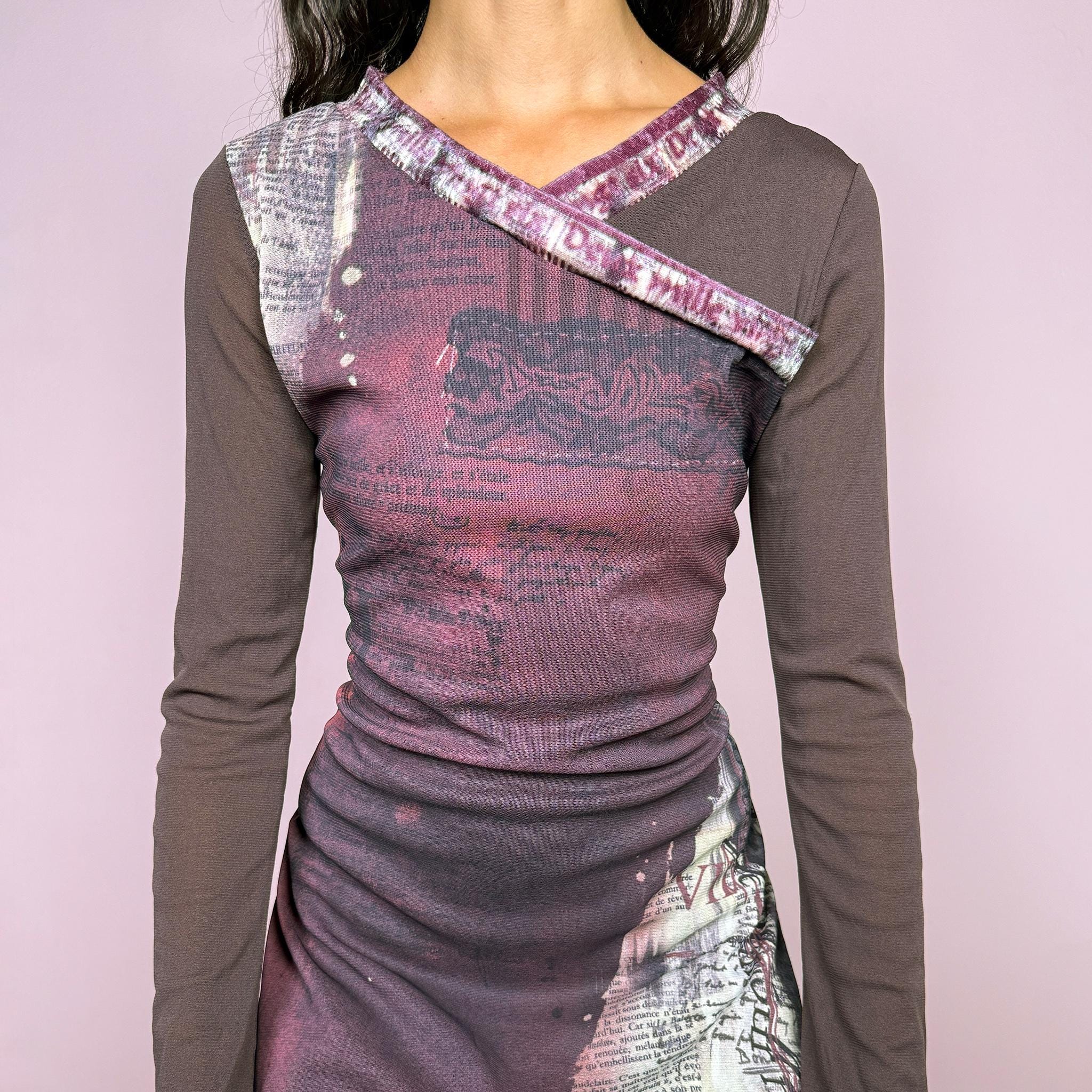 Vintage 2000s avant-garde stretchy mesh dress featuring an abstract layered graphic print in purple and cream tones, with contrasting brown semi-sheer long sleeves, asymmetric neckline detailing, and a dramatic irregular layered hem. The deconstructed style has a distinctly Y2K art-to-wear feel. Made in France by a French brand from polyamide and polyester. Excellent vintage condition.