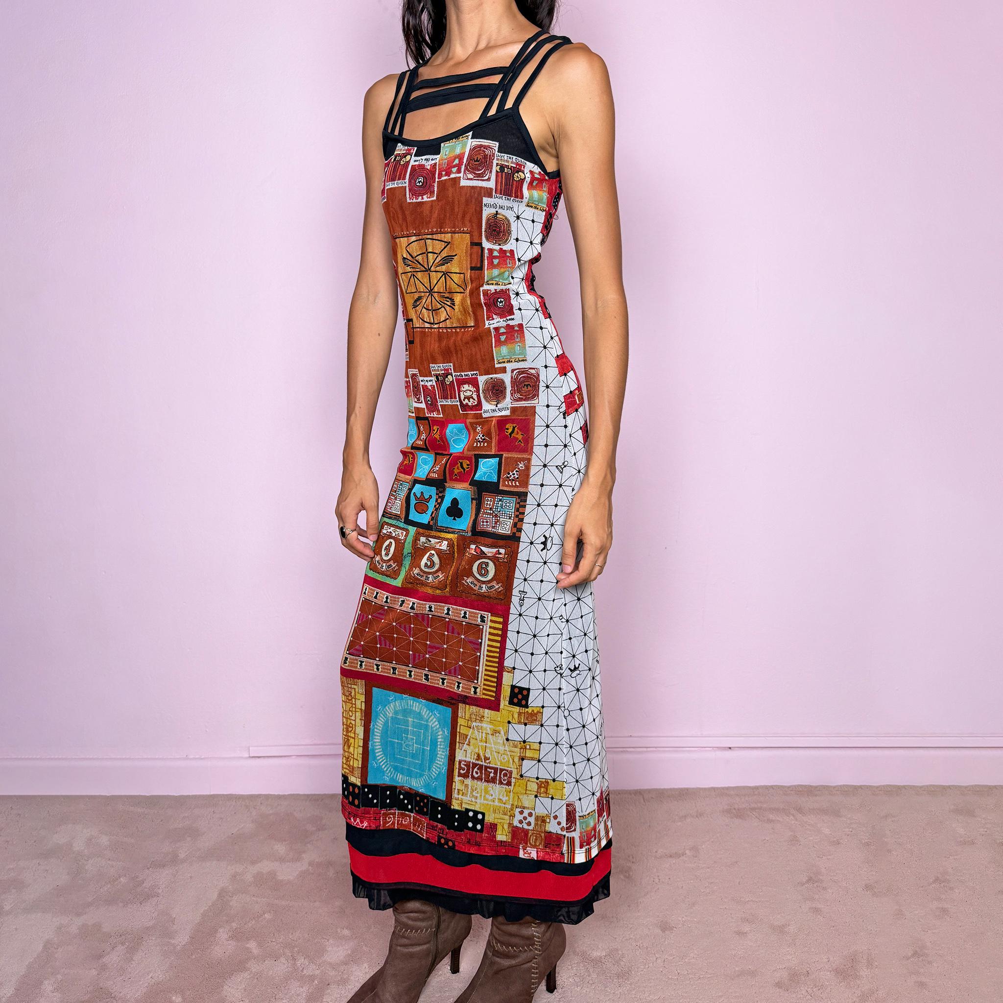 Vintage 2000s Save the Queen maxi dress, made in Italy from stretchy 100% polyamide mesh with a black mesh lining. Featuring an intricate multicolored graphic print with abstract symbols, game-inspired motifs, and richly layered artwork throughout, framed by strappy black mesh detailing across the neckline and shoulders. The long, fitted silhouette and highly detailed print give it a distinctive maximalist, art-to-wear feel characteristic of Y2K Italian fashion.