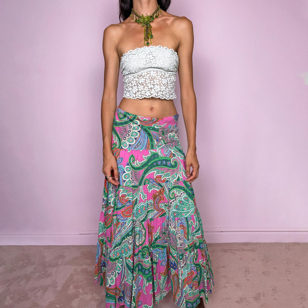 Vintage 2000s bohemian paisley maxi skirt, crafted from 100% cotton with a 100% cotton lining. Features a vibrant all-over paisley print in pink, green, blue, and orange tones, a softly flared tiered silhouette, and an elasticated waist. Can be worn mid- to low-rise for size S. By American brand Lauren Ralph Lauren. Excellent vintage condition.
