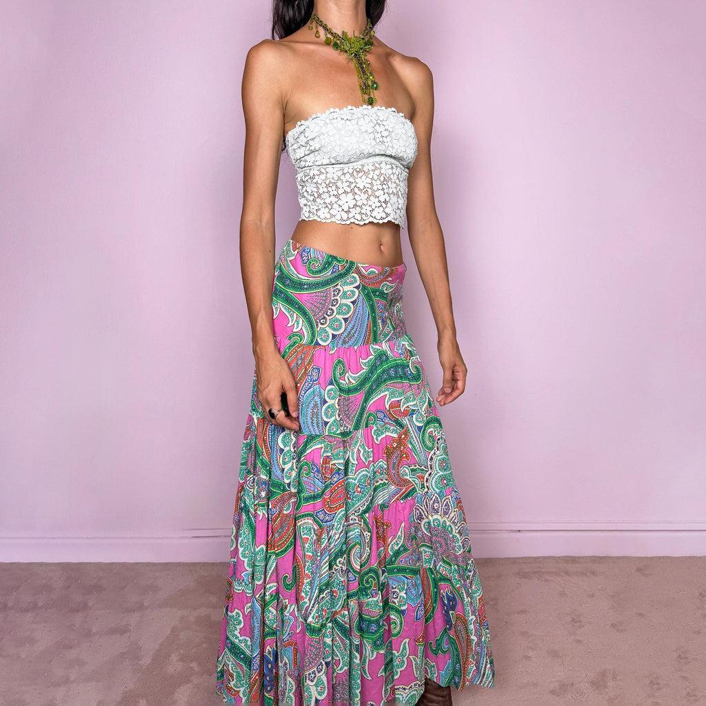 Vintage 2000s bohemian paisley maxi skirt, crafted from 100% cotton with a 100% cotton lining. Features a vibrant all-over paisley print in pink, green, blue, and orange tones, a softly flared tiered silhouette, and an elasticated waist. Can be worn mid- to low-rise for size S. By American brand Lauren Ralph Lauren. Excellent vintage condition.