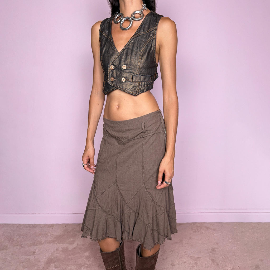 Vintage 2000s brown midi skirt, made in Italy from a structured 95% cotton and 5% elastane blend. Featuring exposed seam detailing, sculptural panel construction, and a flared asymmetric hem finished with raw, frayed edges. Side zip closure. Non-stretch. The earthy, deconstructed construction gives it a rustic, avant-garde aesthetic. Can be worn high-waisted for size M or mid- to lower-rise for sizes S and XS. Excellent vintage condition.