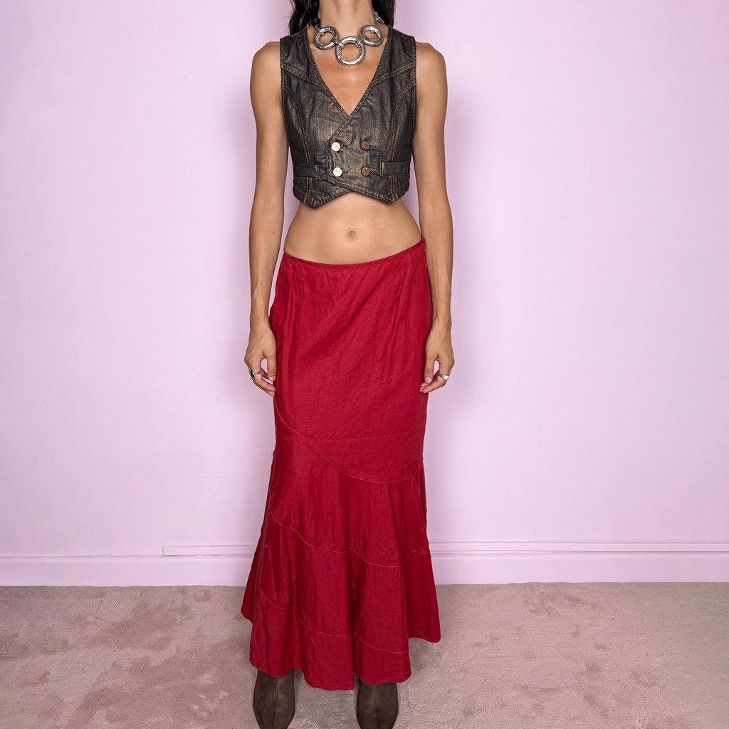 Vintage 2000s red linen midi skirt crafted from 100% linen. Featuring a curved asymmetric seam construction and a layered, flared lower section that creates fluid movement. Finished with a side zip closure. Non-stretch. Can be worn mid-rise for size M or lower on the waist for size S. From a German brand. Great vintage condition.