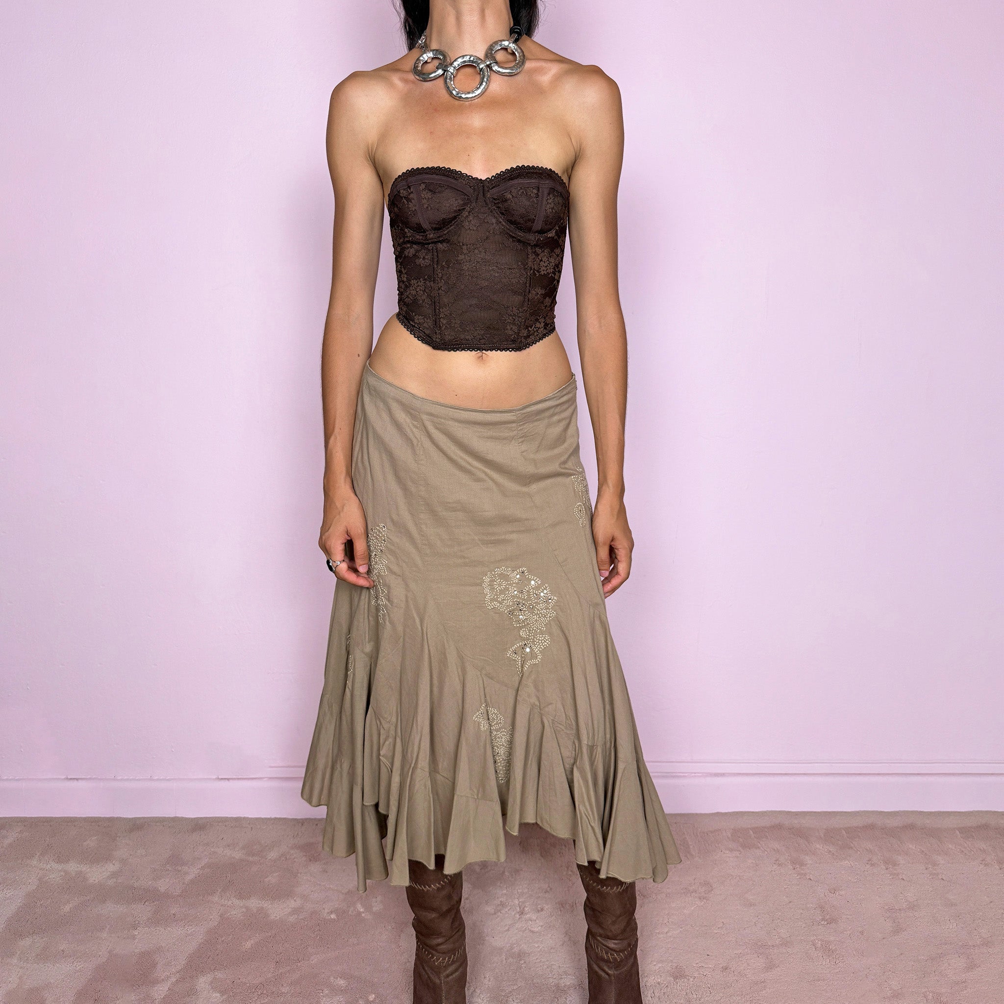 Vintage 2000s khaki beige asymmetric midi skirt in 100% cotton with a side zip closure and no stretch. Features embroidered sequin details, soft paneling, and a flared uneven ruffle hem. Romantic Y2K bohemian style, perfect for fairy summer looks. Can be worn high-waisted for size S or slightly lower on the waist for sizes XS and XXS. From a French brand. Excellent vintage condition.