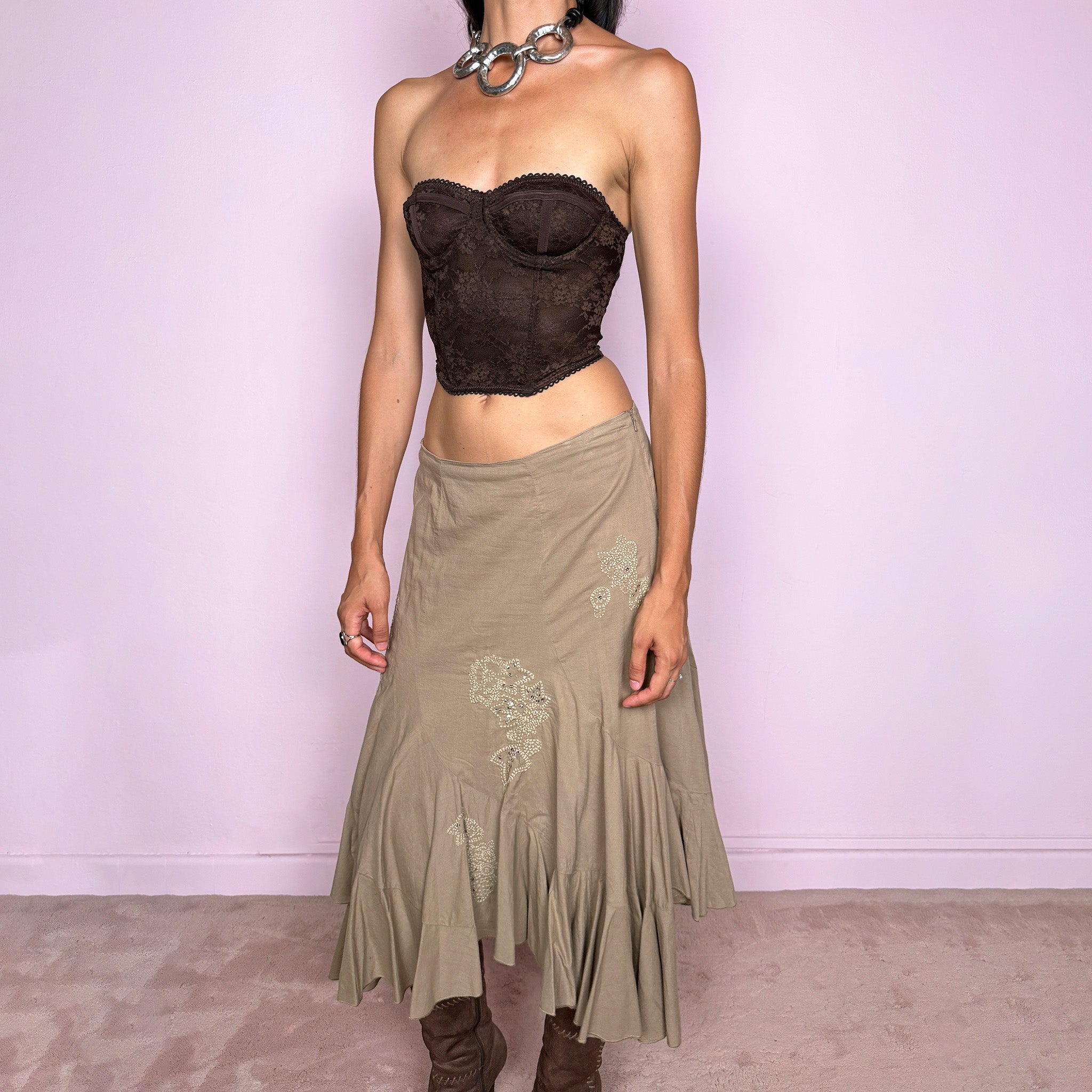 Vintage 2000s khaki beige asymmetric midi skirt in 100% cotton with a side zip closure and no stretch. Features embroidered sequin details, soft paneling, and a flared uneven ruffle hem. Romantic Y2K bohemian style, perfect for fairy summer looks. Can be worn high-waisted for size S or slightly lower on the waist for sizes XS and XXS. From a French brand. Excellent vintage condition.