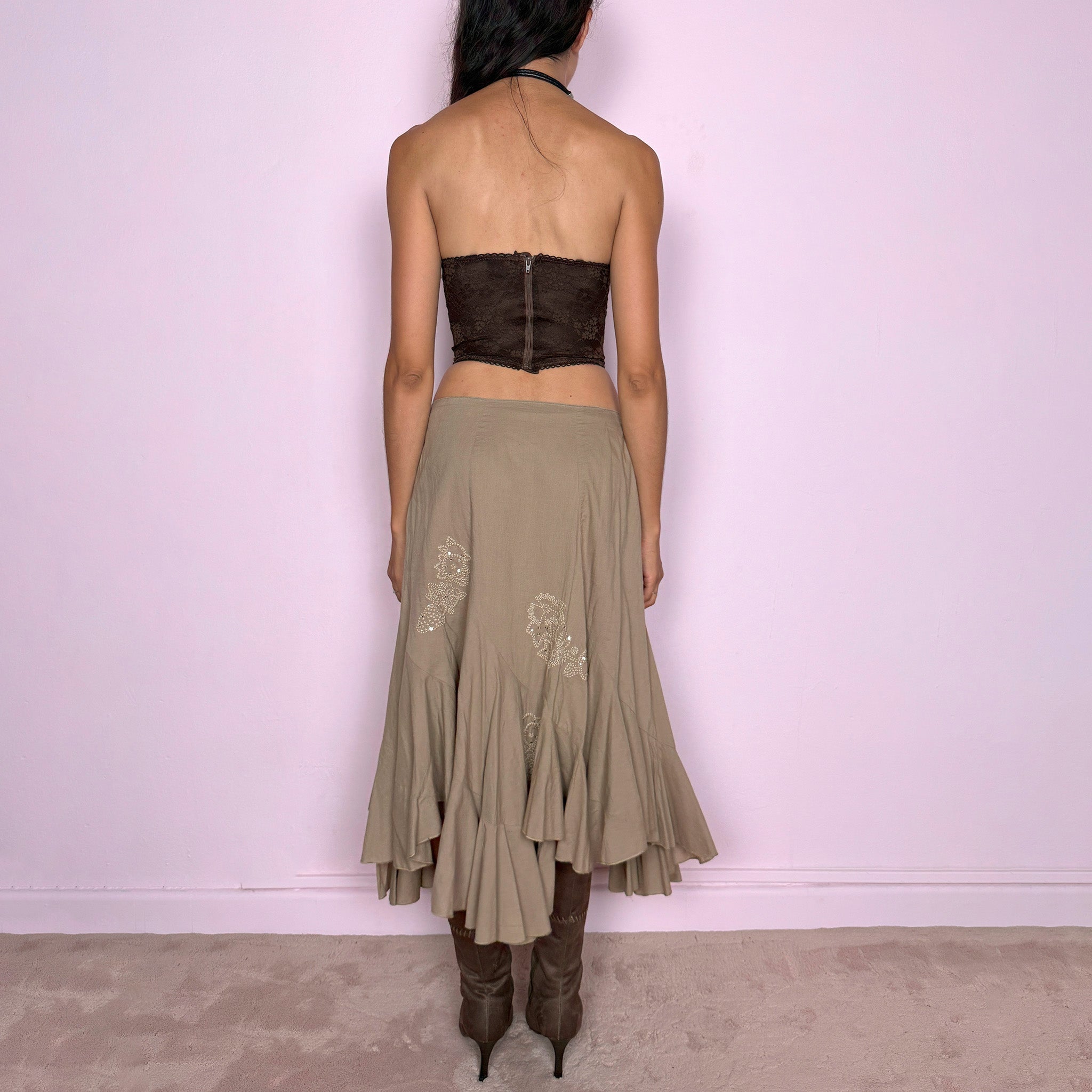Vintage 2000s khaki beige asymmetric midi skirt in 100% cotton with a side zip closure and no stretch. Features embroidered sequin details, soft paneling, and a flared uneven ruffle hem. Romantic Y2K bohemian style, perfect for fairy summer looks. Can be worn high-waisted for size S or slightly lower on the waist for sizes XS and XXS. From a French brand. Excellent vintage condition.
